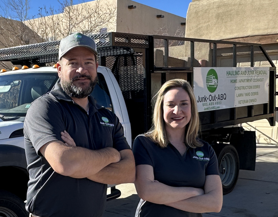 Junk Out ABQ experts in front of truck ready to serve you