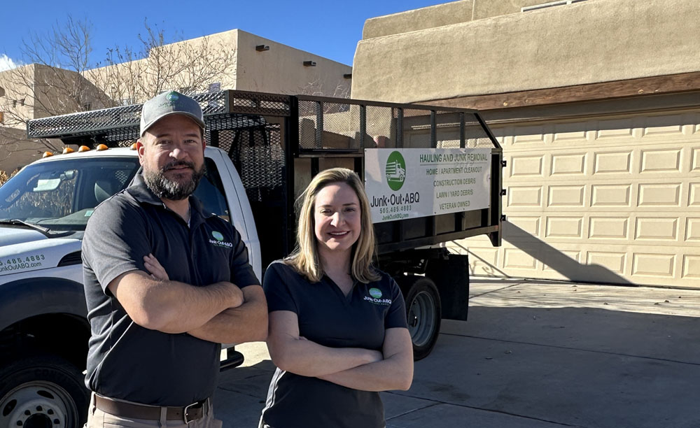 Junk Out ABQ experts in front of truck ready to serve you